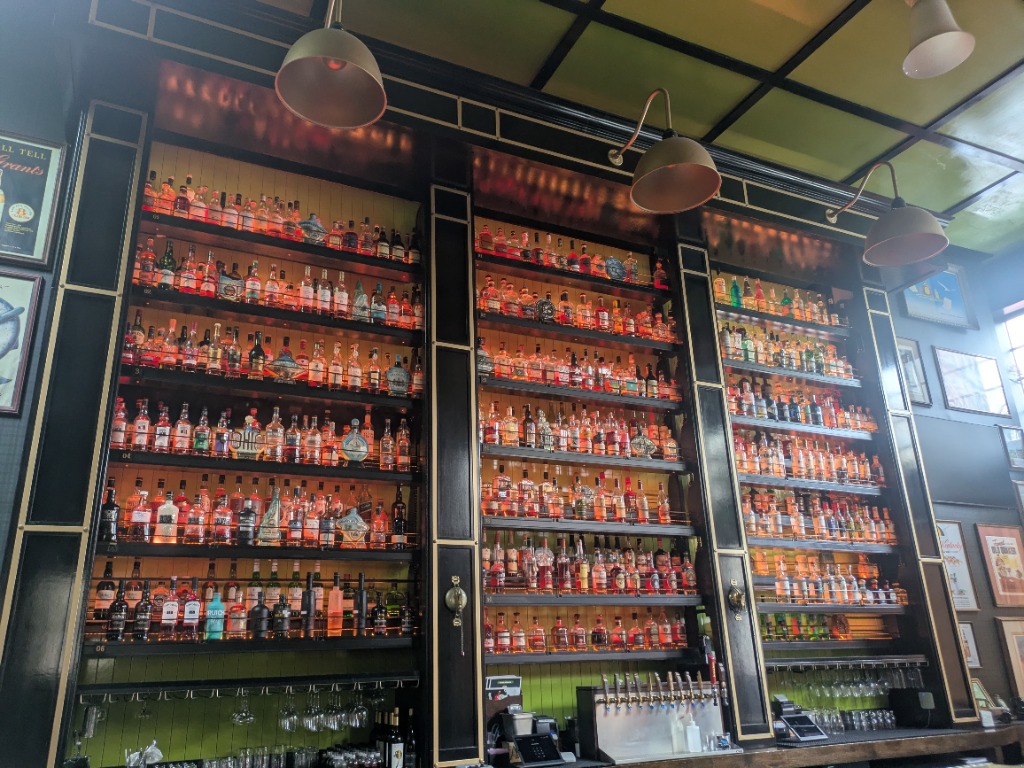 Bottle Club Pub — Rotating Spirits Shelving